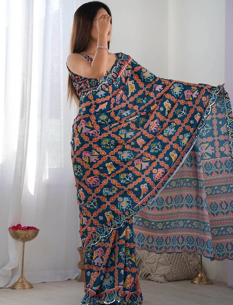 Teal ethnic motifs mirror work pure chiffon ikat saree