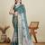 Teal ethnic motifs printed zari saree