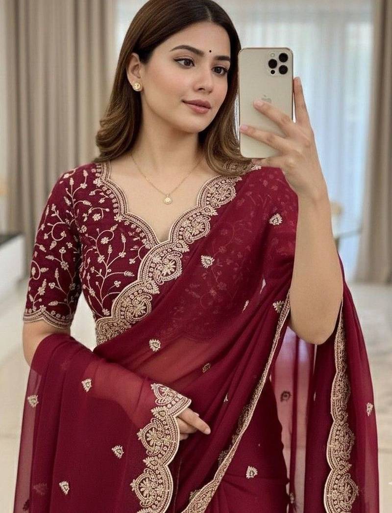 Maroon embellished embroidered poly georgette heavy work saree