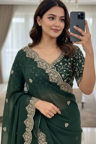 Green embellished embroidered poly georgette heavy work saree