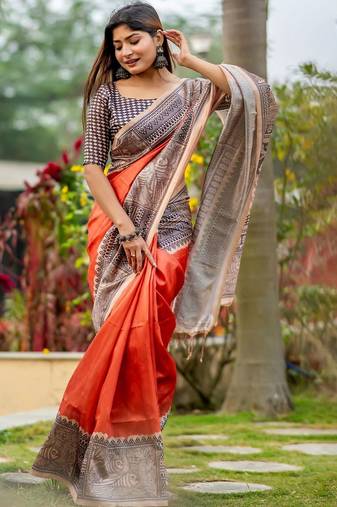Orange ethnic motifs silk blend tussar saree