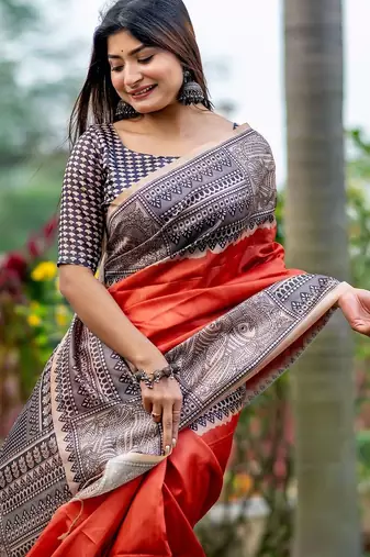 Orange ethnic motifs silk blend tussar saree