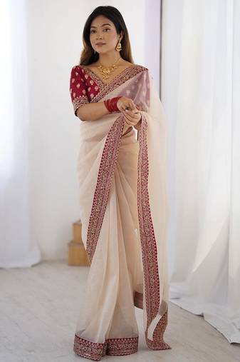 Peach embroidered net banarasi saree
