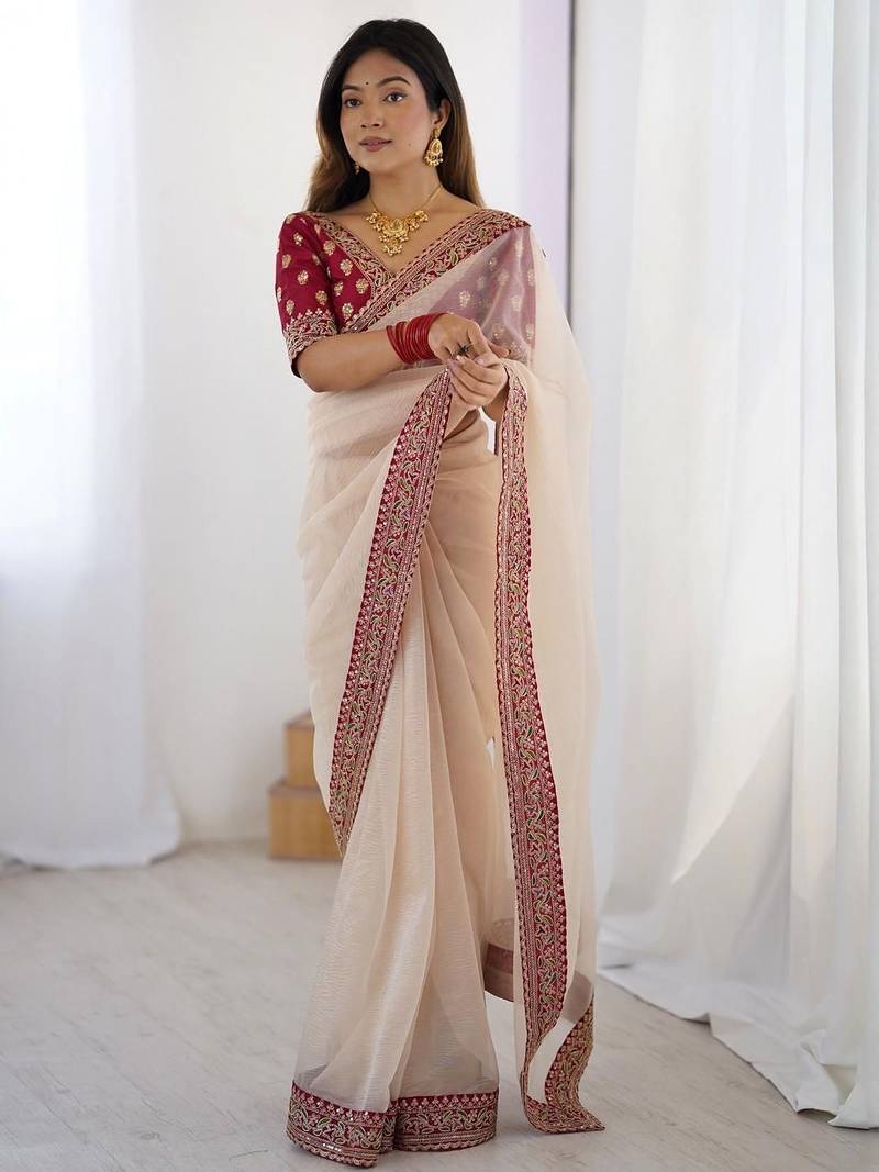 Peach embroidered net banarasi saree