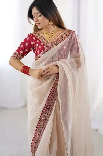 Peach embroidered net banarasi saree