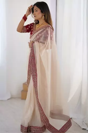 Peach embroidered net banarasi saree