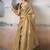 Beige colourblocked zari tissue saree with contrast blouse piece