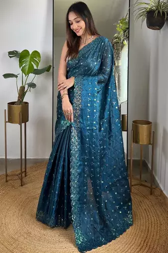Teal embellished embroidered silk blend saree