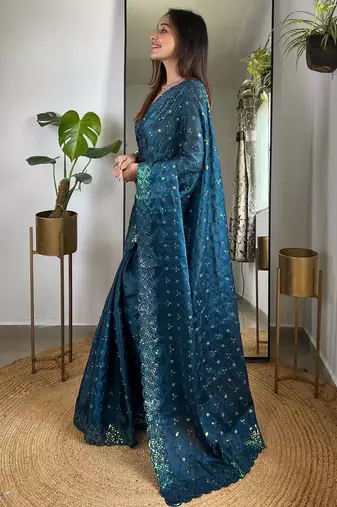 Teal embellished embroidered silk blend saree