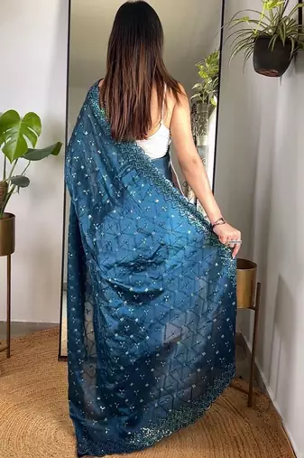 Teal embellished embroidered silk blend saree