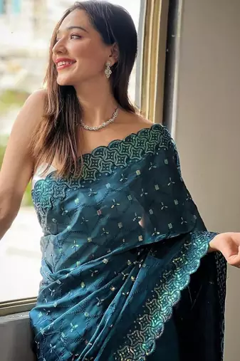 Teal embellished embroidered silk blend saree