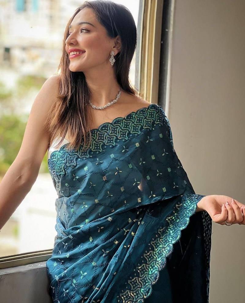 Teal embellished embroidered silk blend saree