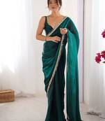 Teal sequinned satin saree
