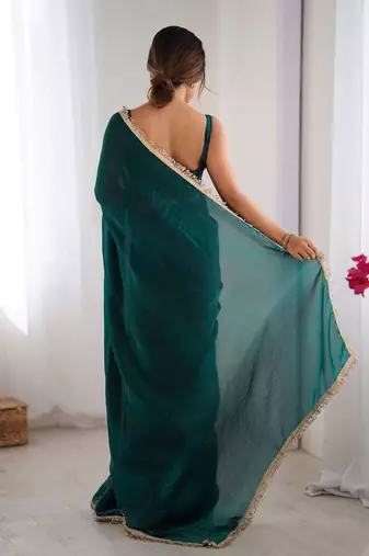 Teal sequinned satin saree