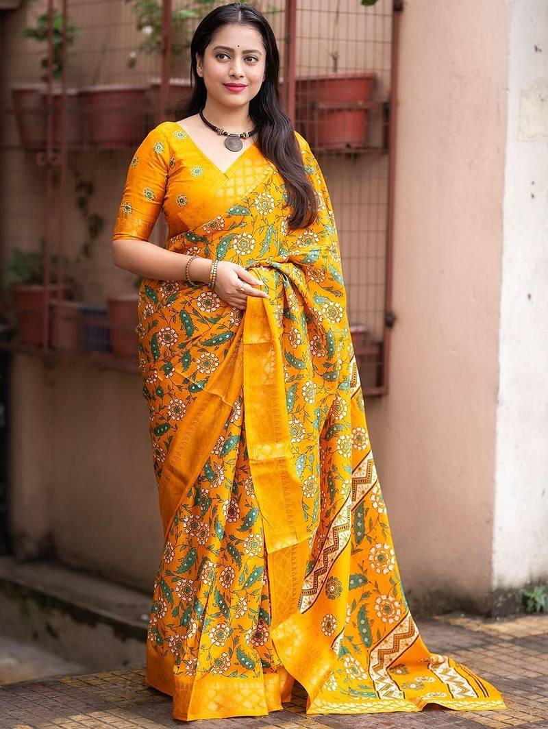 Yellow kalamkari printed woven design zari saree