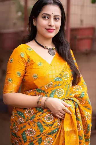 Yellow kalamkari printed woven design zari saree