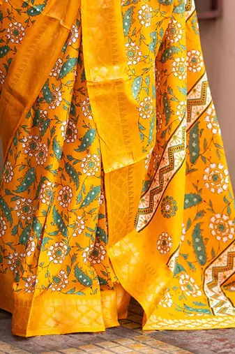 Yellow kalamkari printed woven design zari saree