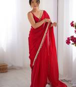 Pink sequinned satin saree