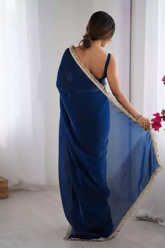 Blue sequinned satin saree