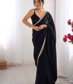 Black sequinned embellished satin saree with blouse piece