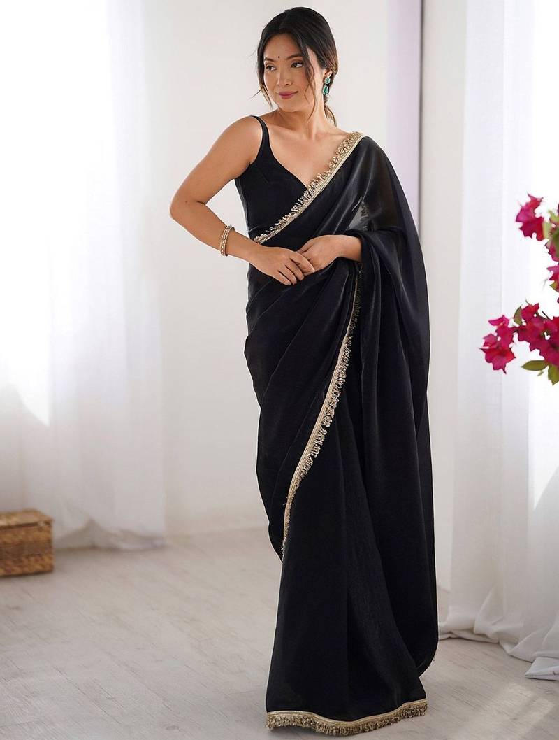 Black sequinned embellished satin saree with blouse piece