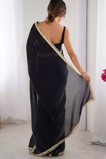 Black sequinned embellished satin saree with blouse piece