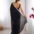 Black sequinned embellished satin saree with blouse piece