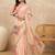 Peach floral beads and stones satin leheriya saree