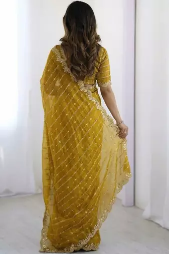 Yellow woven design zari satin heavy work saree