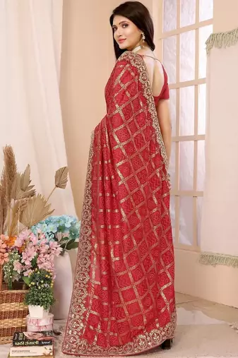 Red woven design zari heavy work saree
