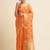 Orange ethnic motifs embroidered saree