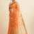 Orange ethnic motifs embroidered saree