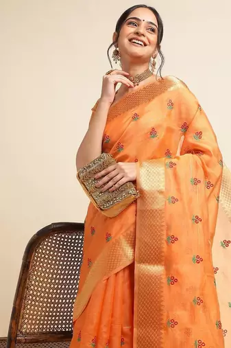 Orange ethnic motifs embroidered saree
