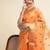 Orange ethnic motifs embroidered saree