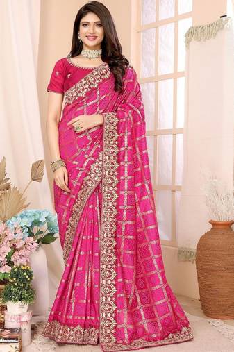 Pink woven design zari heavy work saree