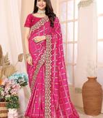 Pink woven design zari heavy work saree