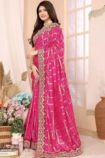 Pink woven design zari heavy work saree