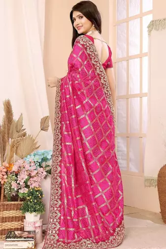 Pink woven design zari heavy work saree