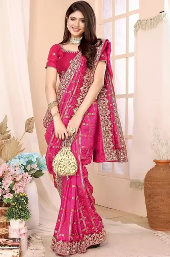Pink woven design zari heavy work saree