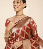 Maroon woven design zari organza saree
