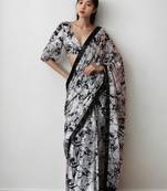 White floral print monochrome saree with unstitched blouse piece