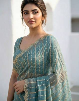 Teal embellished zari satin heavy work saree 4