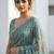 Teal embellished zari satin heavy work saree