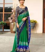 Green ethnic motifs zari poly chiffon saree