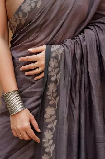 Purple woven design linen blend saree