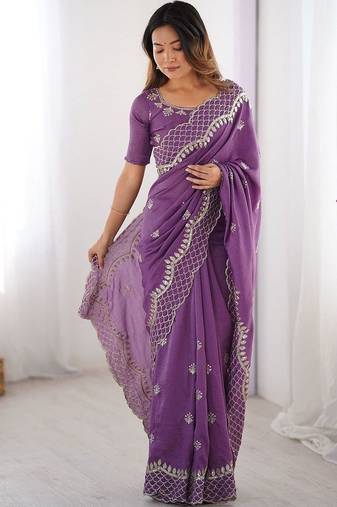 Purple ethnic motifs embroidered beads and stones pure silk saree