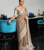 Beige woven design zari saree