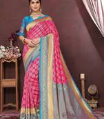 Pink ethnic motifs woven design zari banarasi saree