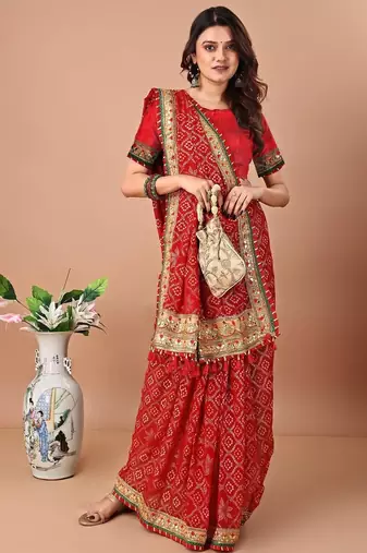 Red bandhani printed gotta patti saree with unstitched blouse piece