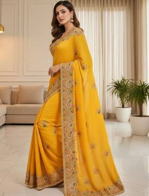 Yellow ethnic motifs embroidered organza heavy work saree 3